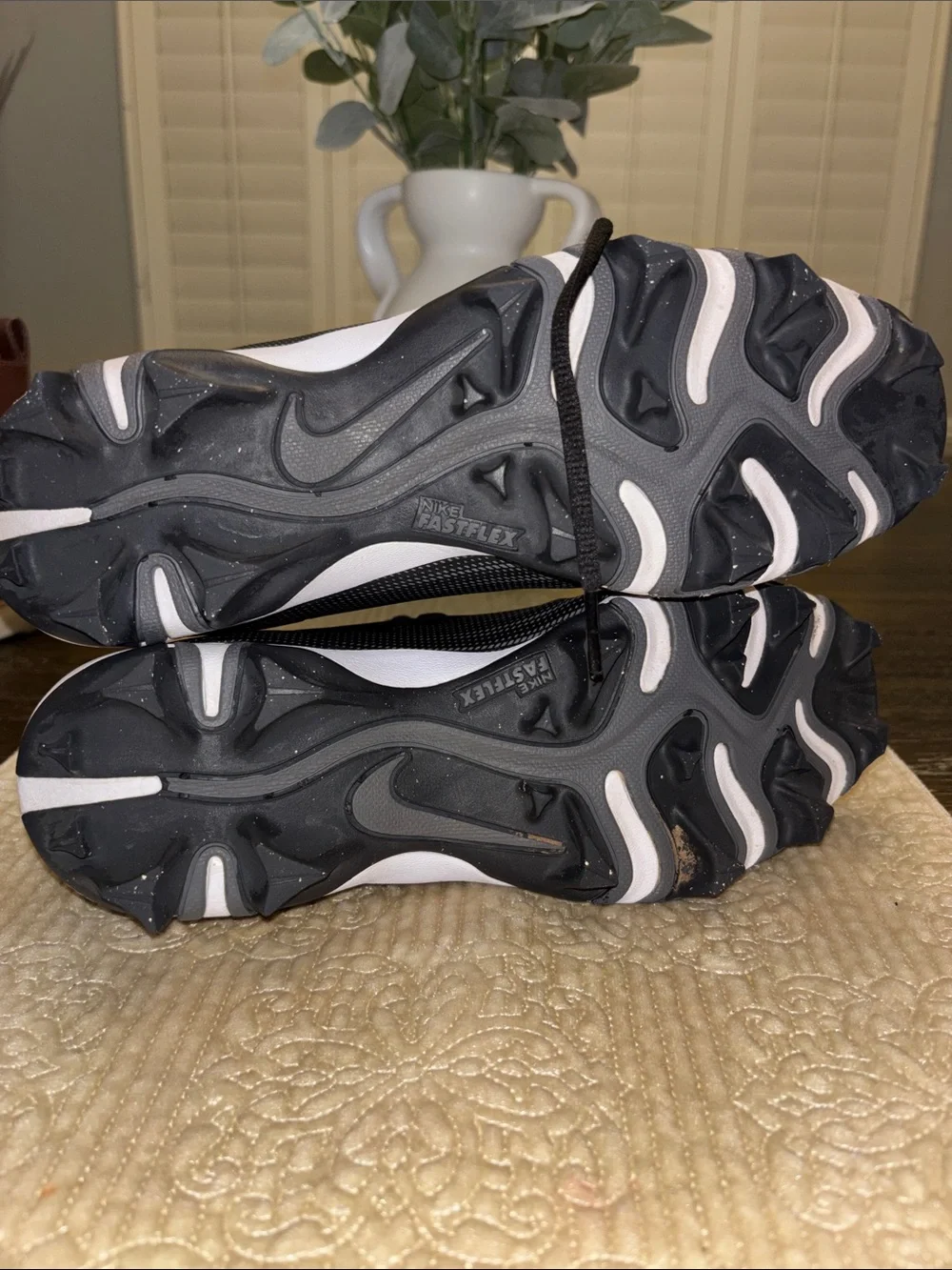 Youth Nike Black and Gray Football Cleats with Silver Swoosh